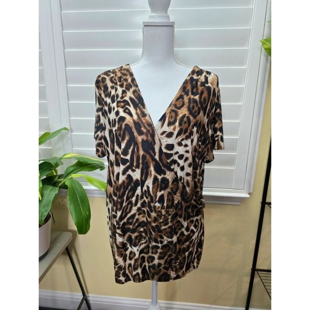 Star vixen animal print stretchy short sleeve wrap top size Large